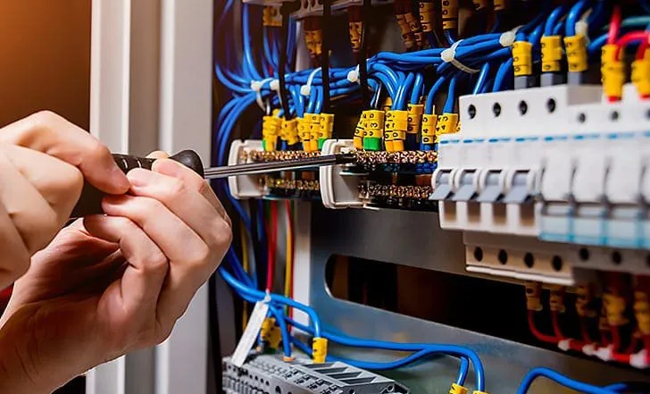 Licensed electrician performing electrical installation
